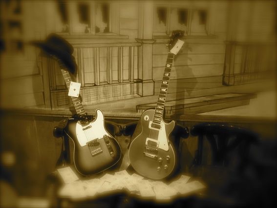Guitarras sobre fondo sepia